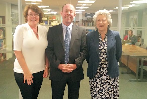 Phil Sykes with Mrs Penny Gluckstein and Amanda Graves in the Library Special Collections and Archives
